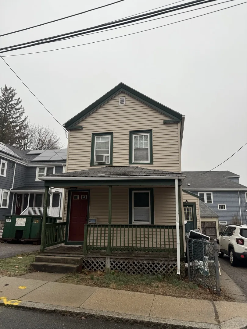 Before photo of the Dorchester home exterior