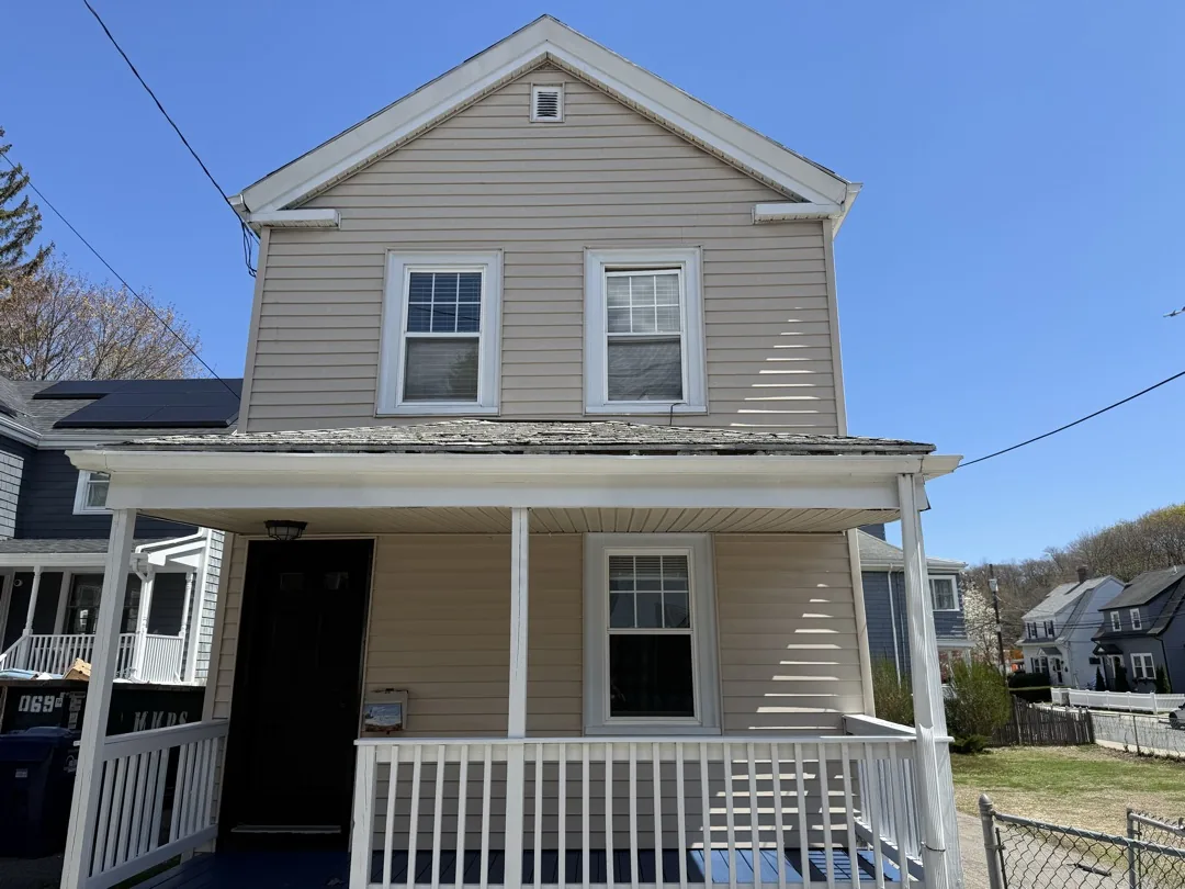 Front view of the Dorchester exterior painting project after completion